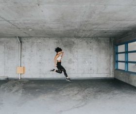 Stock Photo Woman jumping in the room