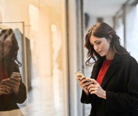 Stock Photo Woman looking at cell phone 01