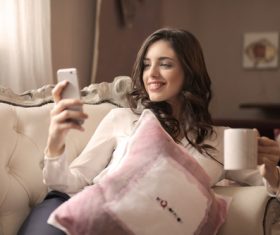 Stock Photo Woman looking at cell phone 05