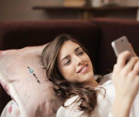 Stock Photo Woman looking at cell phone 07