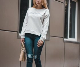 Stock Photo Woman standing on the street