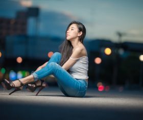 Stock Photo Woman under the street lamp