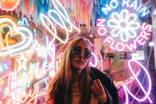 Stock Photo Woman with colorful lights background
