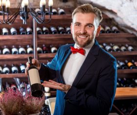 Waiter introduces wine Stock Photo