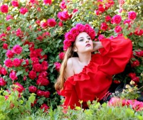 Woman with a wreath of roses on the head Stock Photo 01