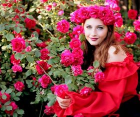 Woman with a wreath of roses on the head Stock Photo 03