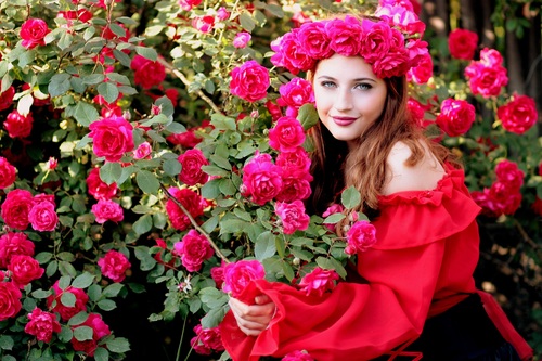 Woman with a wreath of roses on the head Stock Photo 03