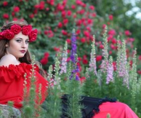 Woman with a wreath of roses on the head Stock Photo 06