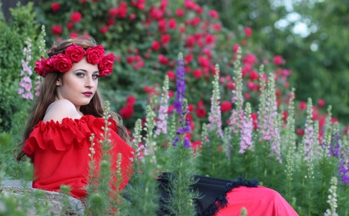 Woman with a wreath of roses on the head Stock Photo 06