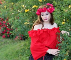 Woman with a wreath of roses on the head Stock Photo 08