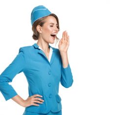 Young beautiful airplane stewardess Stock Photo 01