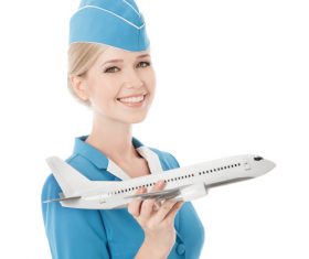Young beautiful airplane stewardess Stock Photo 07