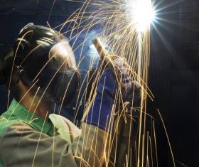 Electric welder working Stock Photo 01