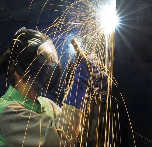 Electric welder working Stock Photo 01