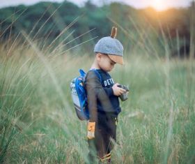 Little boy holding camera Stock Photo