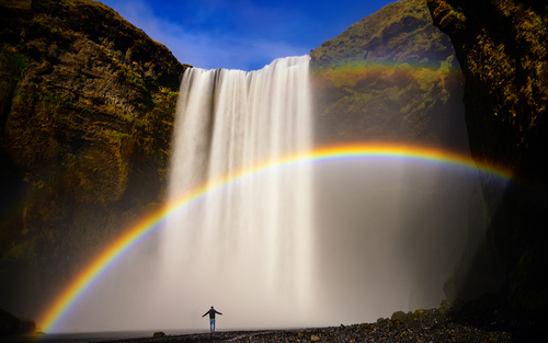 Stock Photo Admire the beautiful waterfall people