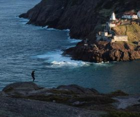 Taking pictures of people standing on the beach Stock Photo 04