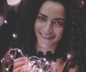 Woman and shining lamp Stock Photo 01