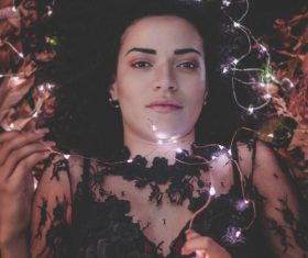 Woman and shining lamp Stock Photo 05