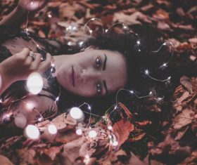 Woman and shining lamp Stock Photo 08