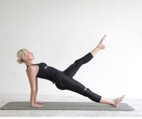 Woman doing yoga pilates Stock Photo