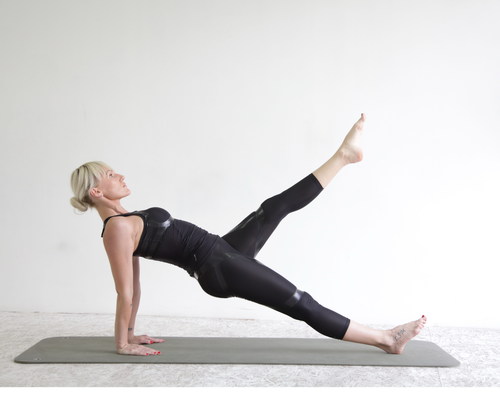 Woman doing yoga pilates Stock Photo