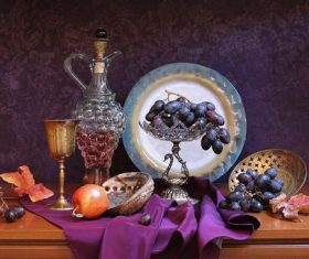 Apples and grapes on purple cloth Stock Photo