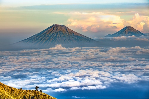 Beautiful landscape of volcano and sea of clouds Stock Photo