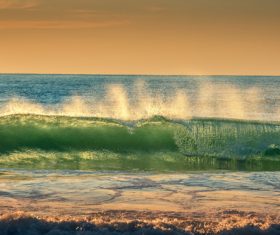 Big waves rolling up on the sea Stock Photo