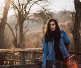 Black long hair beautiful girl on the farm Stock Photo