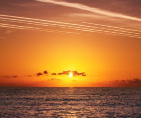 Calm sea under the setting sun Stock Photo