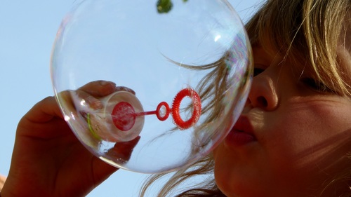 Children blowing bubbles Stock Photo 01