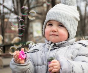 Children blowing bubbles Stock Photo 04