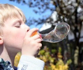 Children blowing bubbles Stock Photo 05