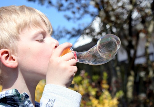 Children blowing bubbles Stock Photo 05