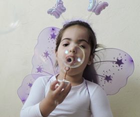 Children blowing bubbles Stock Photo 09
