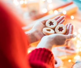 Christmas Cookies in Woman Hands Stock Photo