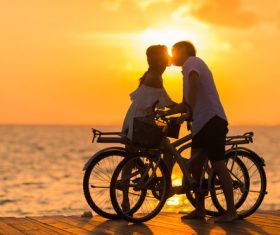 Couple kissing in the morning sun Stock Photo