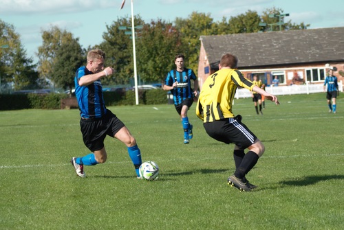 Fast-paced soccer game Stock Photo 01