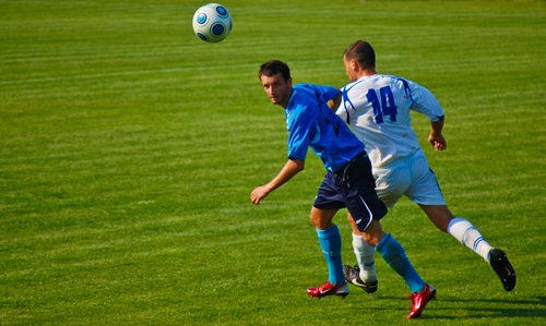 Fast-paced soccer game Stock Photo 04