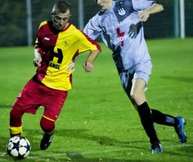 Fast-paced soccer game Stock Photo 07