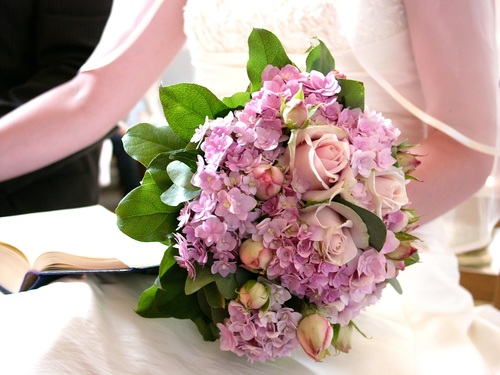 Flowers in the hands of the bride Stock Photo 01