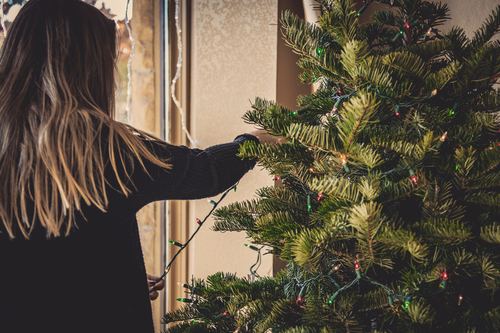 Girl decorating christmas tree Stock Photo 01