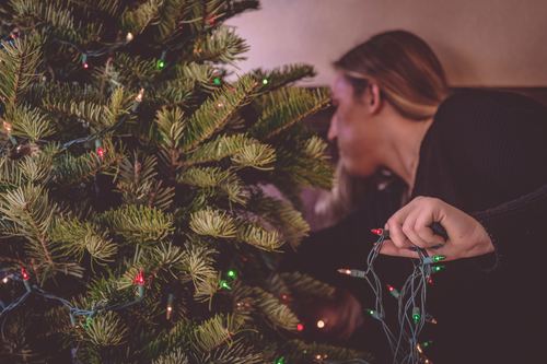 Girl decorating christmas tree Stock Photo 06