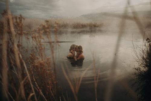 Intimate lovers in the water Stock Photo