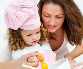 Mother and daughter making cookies together Stock Photo 04