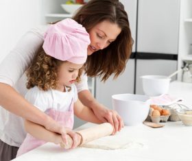 Mother and daughter making cookies together Stock Photo 05