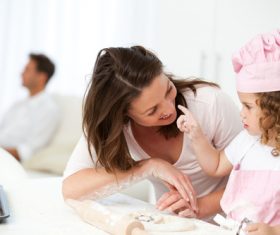 Mother and daughter making cookies together Stock Photo 07