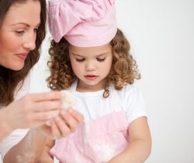 Mother and daughter making cookies together Stock Photo 08