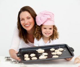 Mother and daughter making cookies together Stock Photo 09